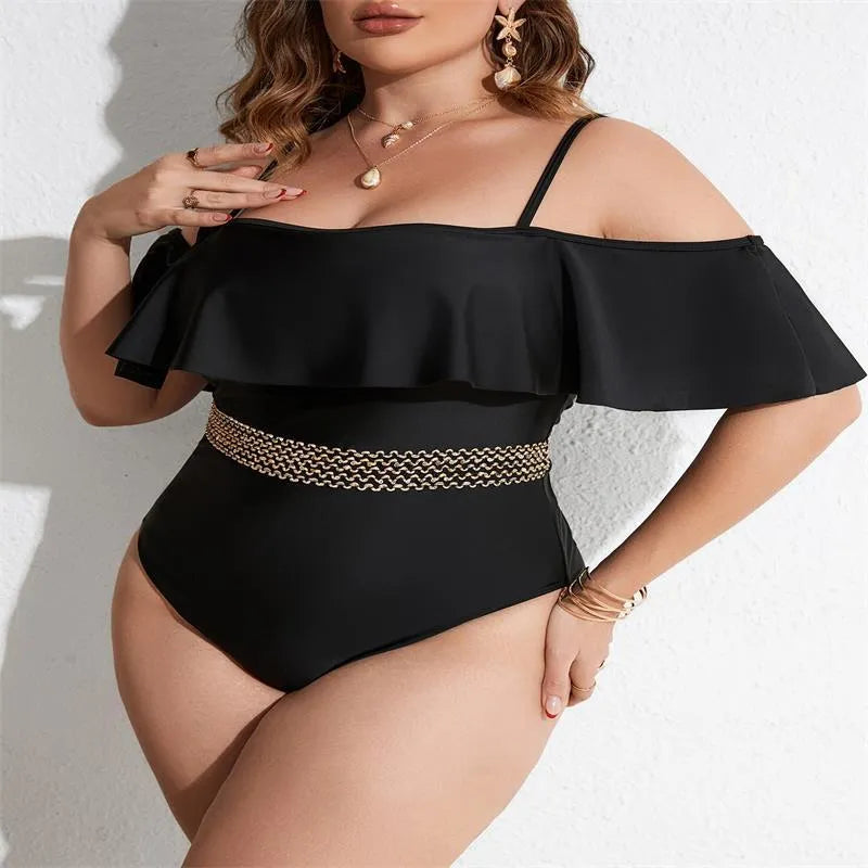 Black solid colour one-piece swimsuit for women in plus sizes on a mannequin.