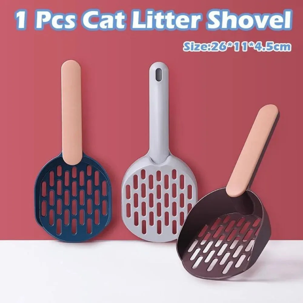 Blue plastic cat litter shovel on a white background showing its size and scoop shape.