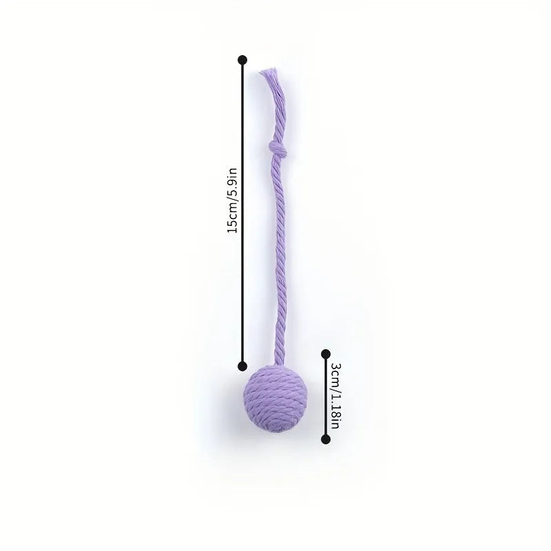 Colourful cat toy ball with an attached rope and built-in bell for kittens, shown in green, pink, purple, and yellow.