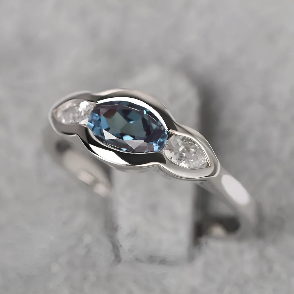 Women's geometric ellipse ring with inlaid zircon stones in white gold colour