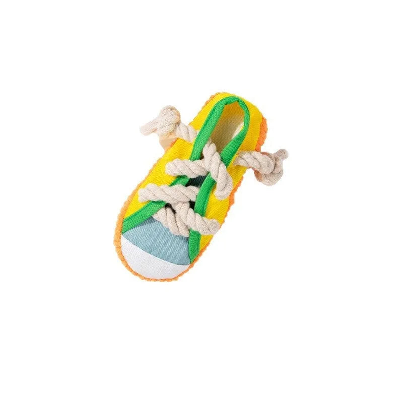 Plastic squeaky slipper-shaped dog chew toy in yellow, black, or blue.