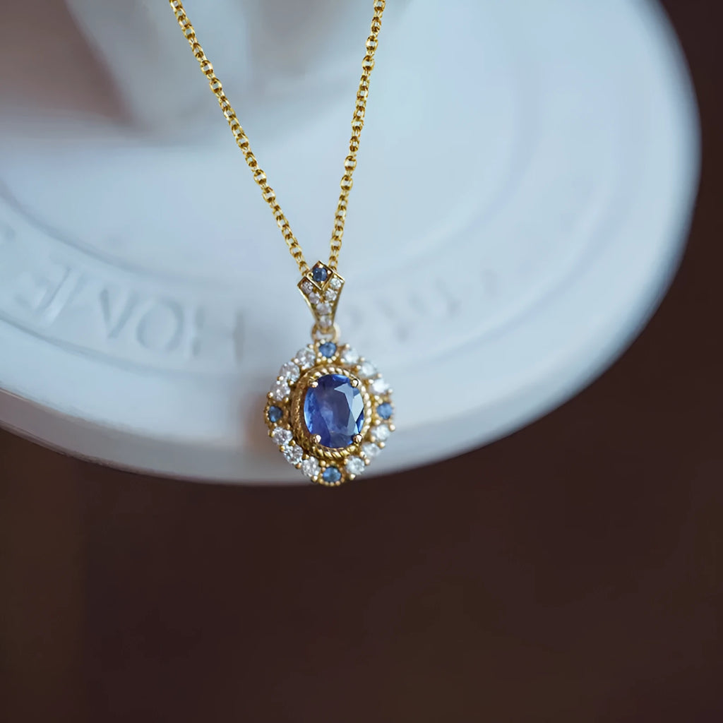Women's adjustable royal necklace with mixed gem and zircon pendant on a copper box chain.