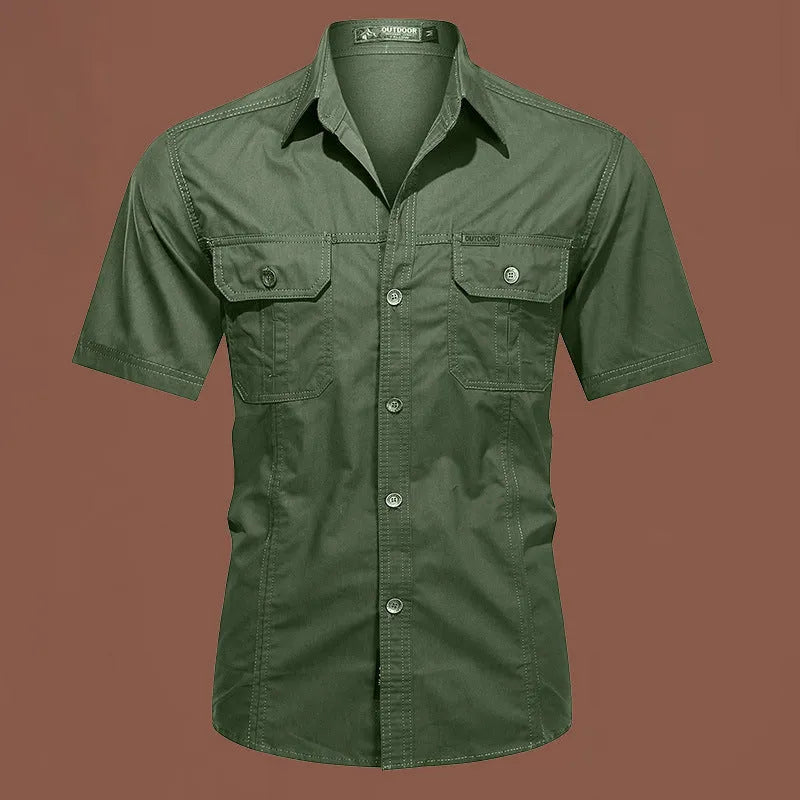 Man wearing a loose-fit army green short sleeve cotton work shirt with a cardigan style.