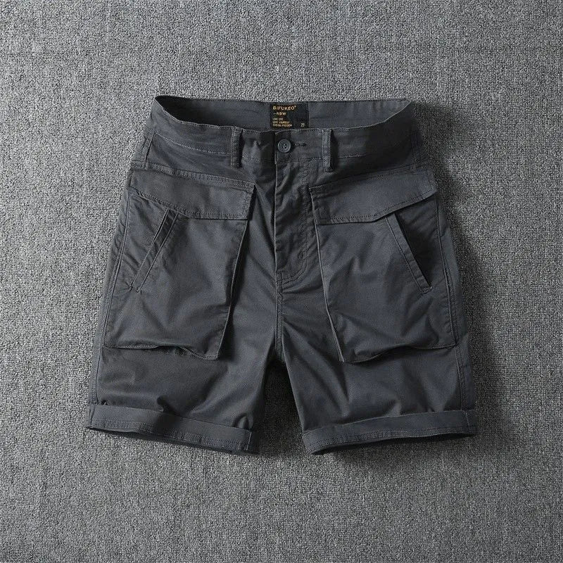 Men's straight-leg cotton cargo shorts with stretch in multiple colour options on a size chart.