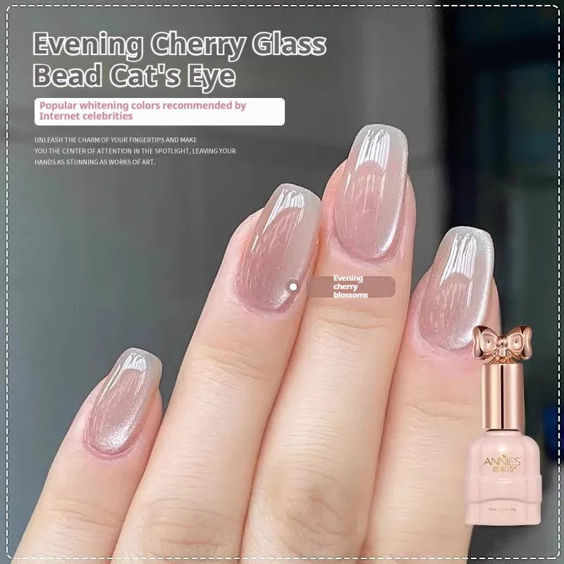 Micro glass bead cat's eye gel nail polish bottle showing cat's eye visual effect