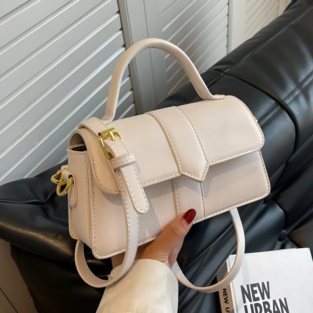 Women's beige PU leather messenger bag showing horizontal square shape and front sandwich pocket