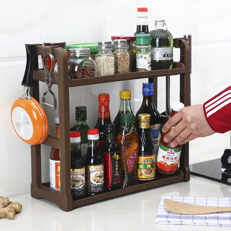 Foldable kitchen storage rack with multilayer shelves in white colour on countertop