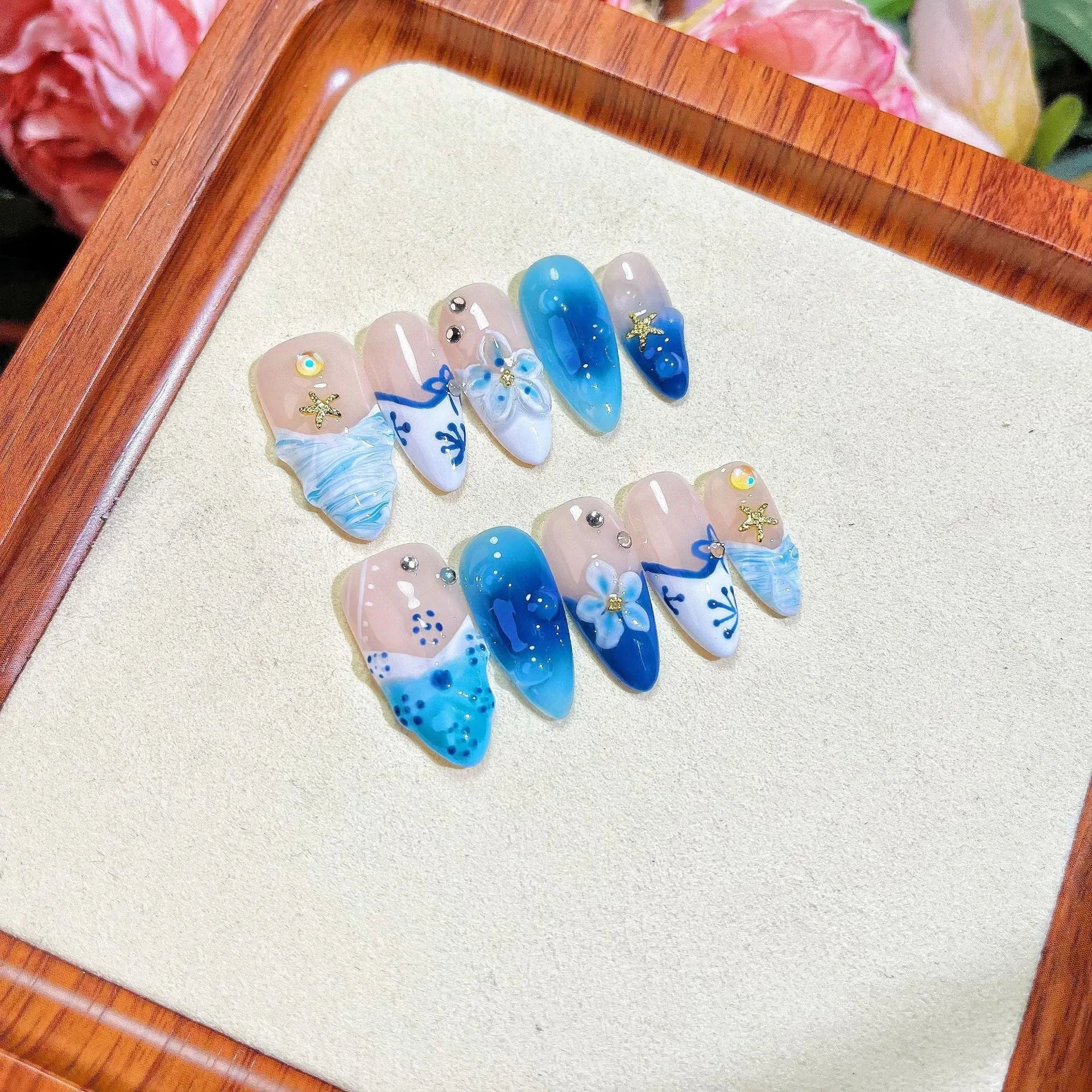 Blue hand-painted carved summer ice transparent false nails set in plastic with sizes XS S M L