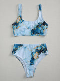 Women's high waist bikini set in a marble tie-dye print, showing U-neck top and briefs.