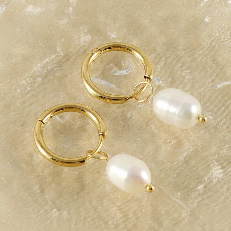 Gold geometric pearl earrings for women made from stainless steel and titanium steel wire.