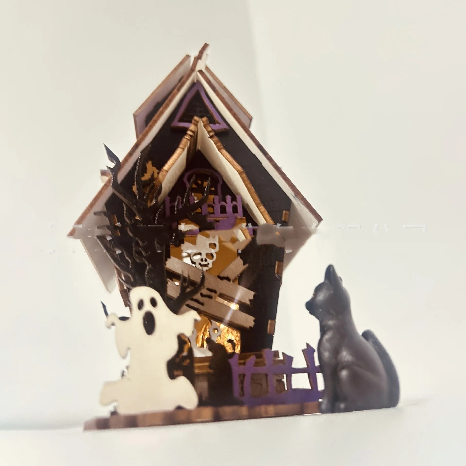 Wooden haunted house Halloween decoration with luminous finish, 14 cm wide candlestick holder