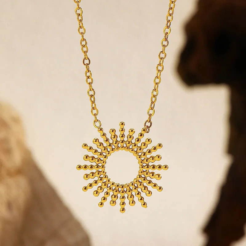 Gold tone geometric chain necklace and bracelet jewellery set for women