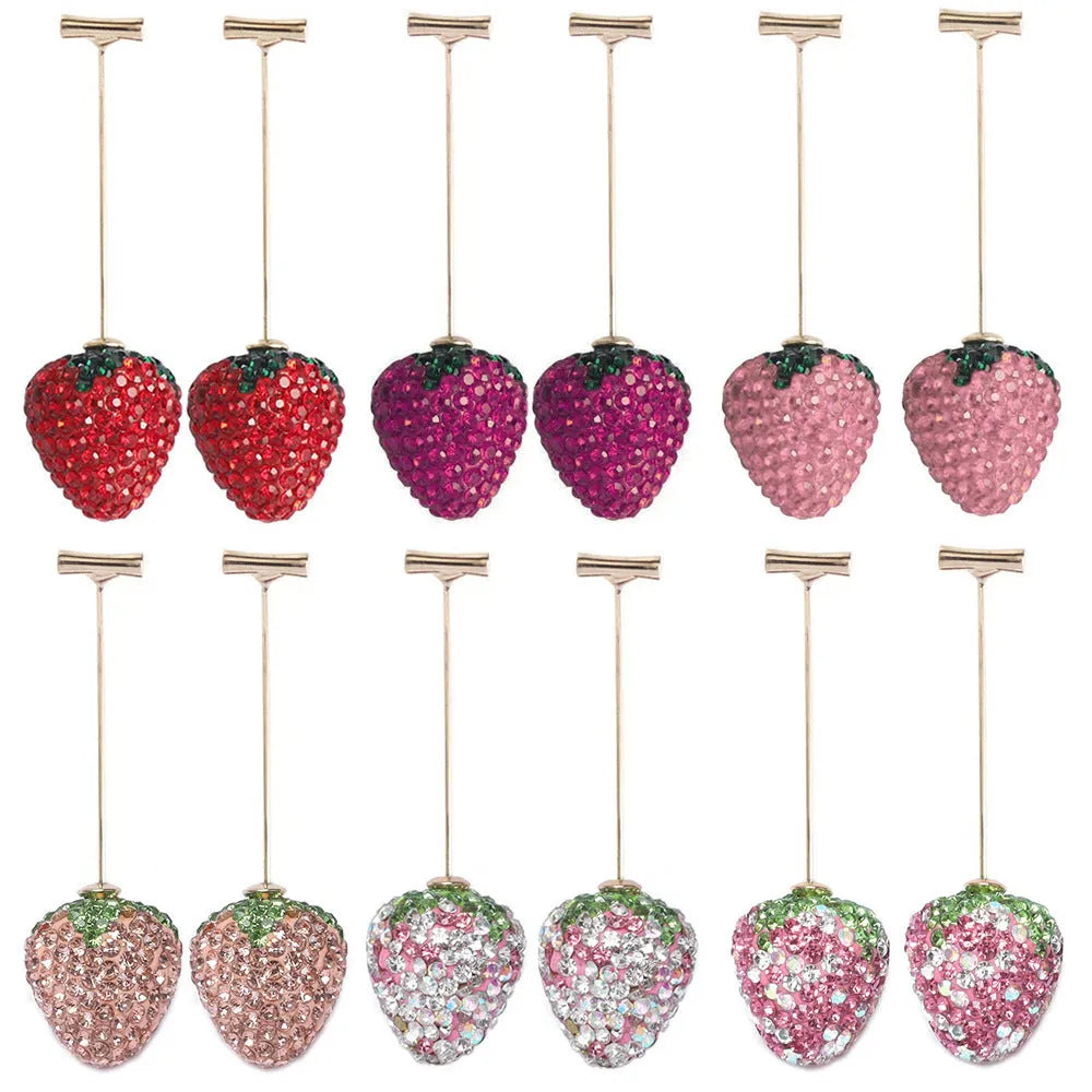 Red zinc alloy strawberry earrings with geometric shape and spot drill texture.