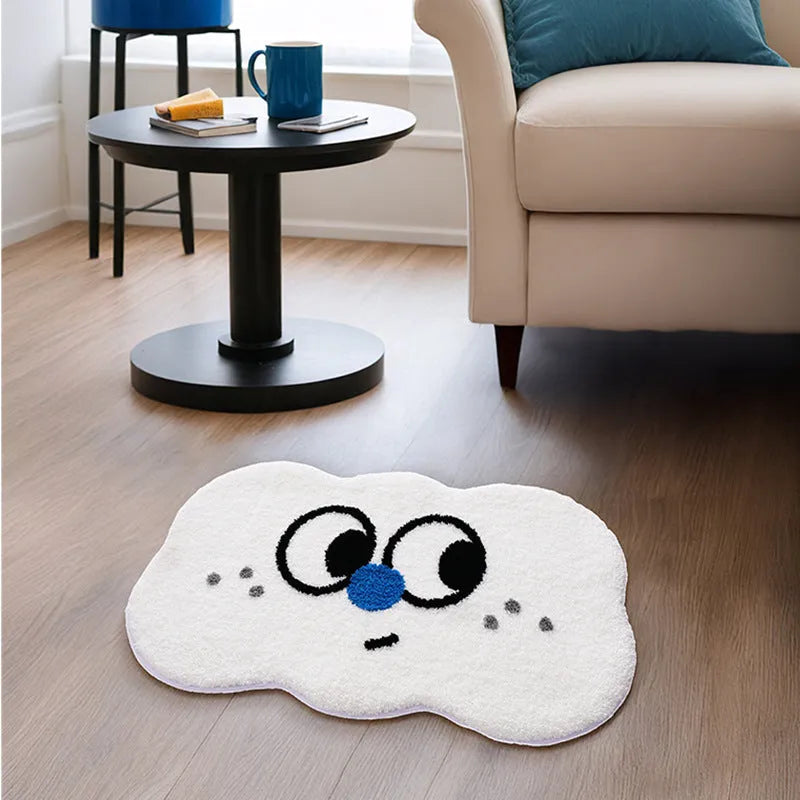 Colourful Big Eye Clouds cartoon character printed on a soft, plush light green bathroom mat.
