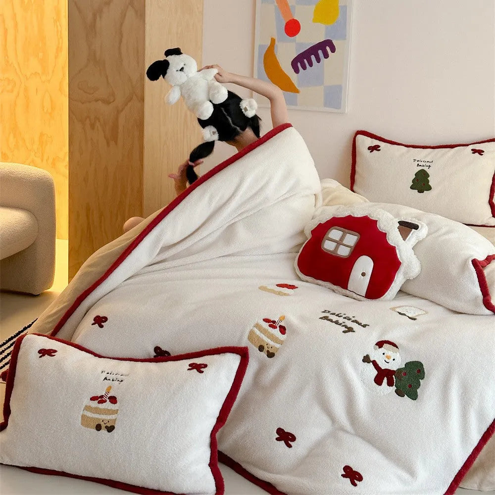 Girl's winter Christmas cartoon pattern bedding four-piece set showing duvet cover, sheet, and pillowcases