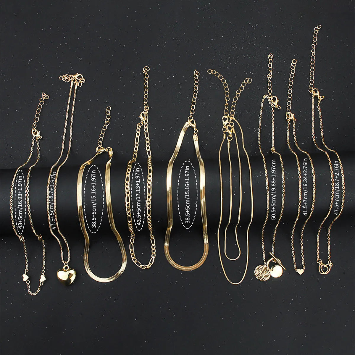 10-piece gold electroplated women's necklace set with snake bone chains and alloy pendants