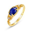 Women's sterling silver ring with a blue lapis lazuli stone in an ellipse shape.