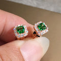 Square copper earrings with bright green zircon stones in electroplated gold and rose gold finishes