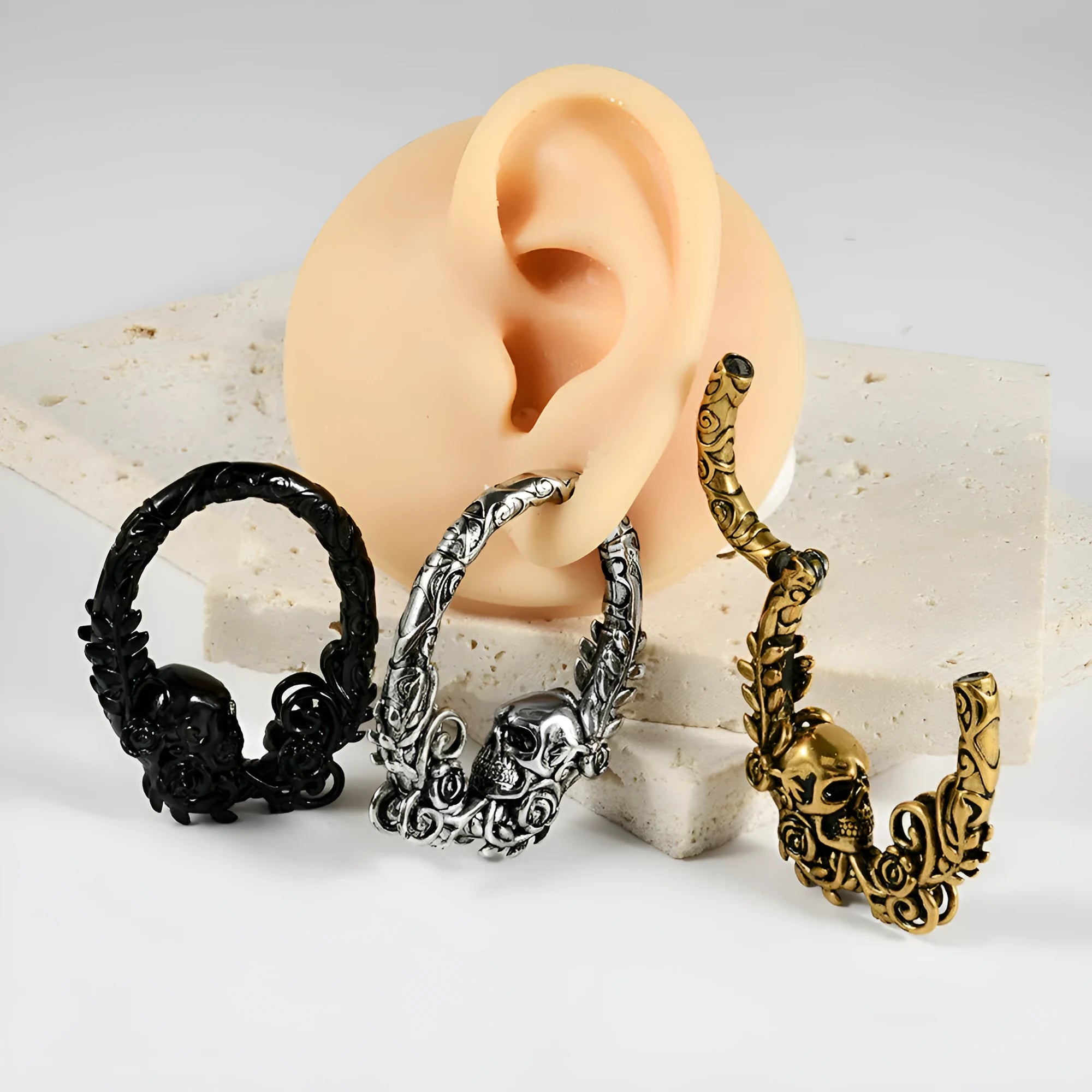 Stainless steel totem patterned fashion earrings with electroplated finish