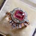 Women's retro style geometric ring in rose gold tone with ruby-coloured design element