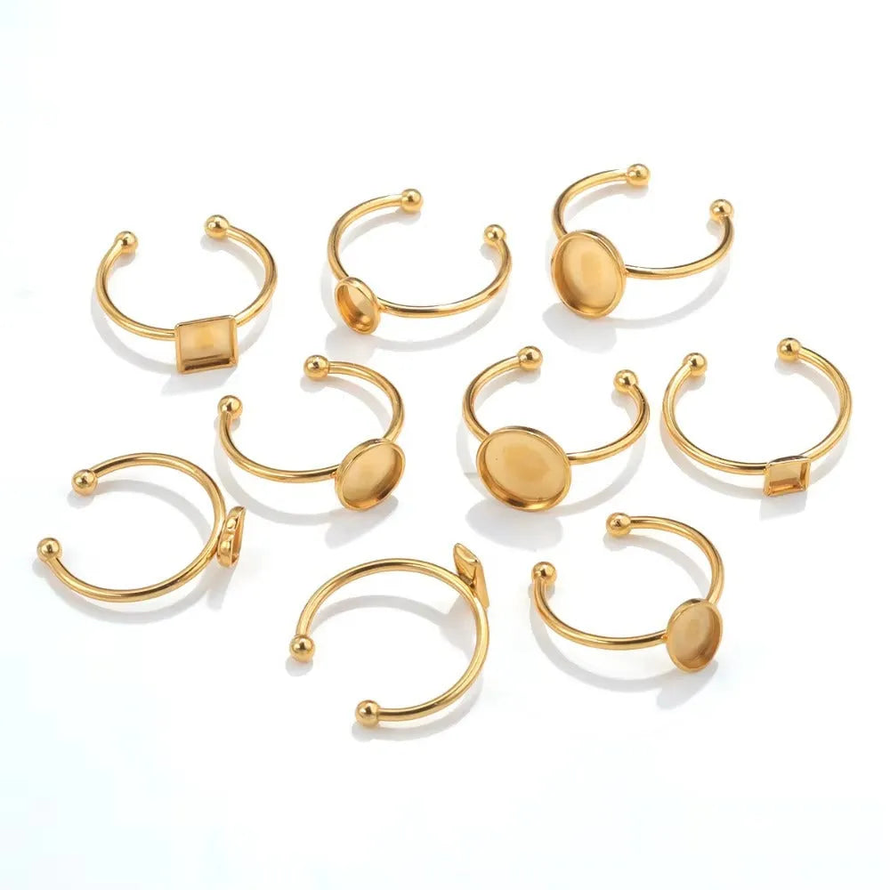 Stainless steel golden electroplated ring settings in multiple shapes including oval, heart, rectangle, round and square