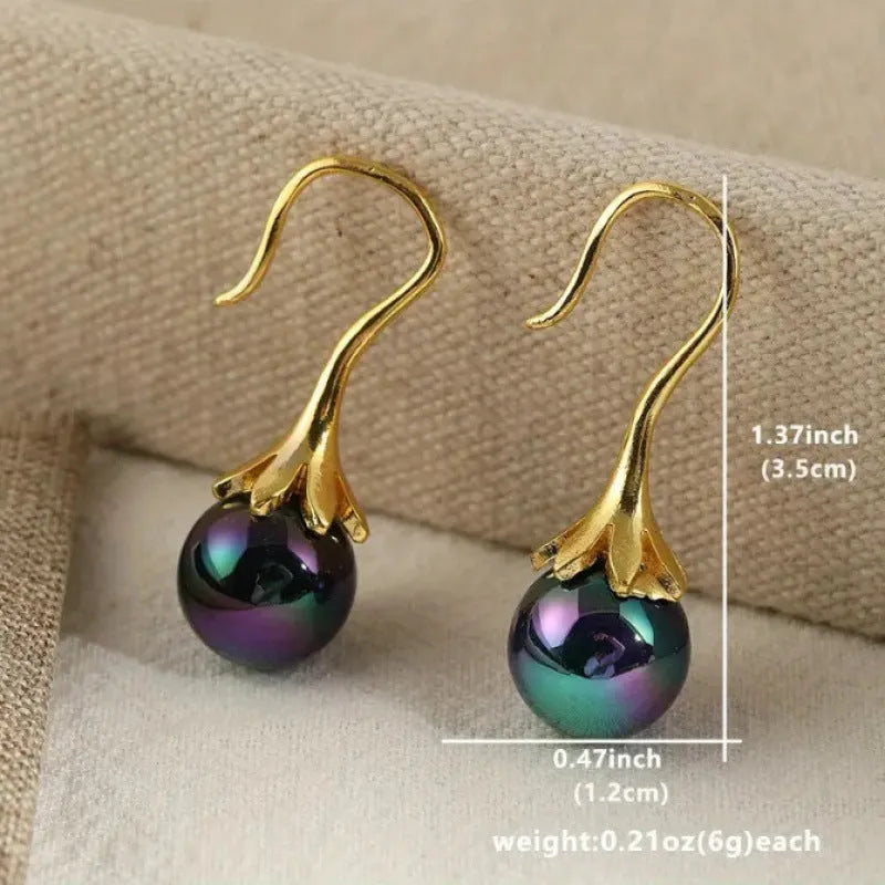 Gold retro style women's fashion earrings with creative design