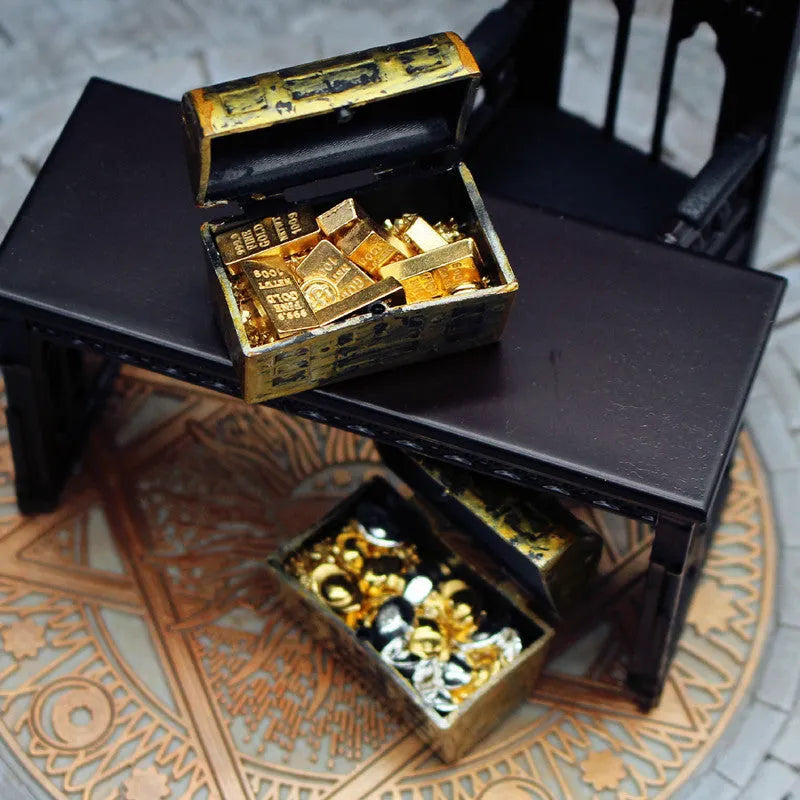 Alloy gold coin treasure box and gold bar doll house accessory set.