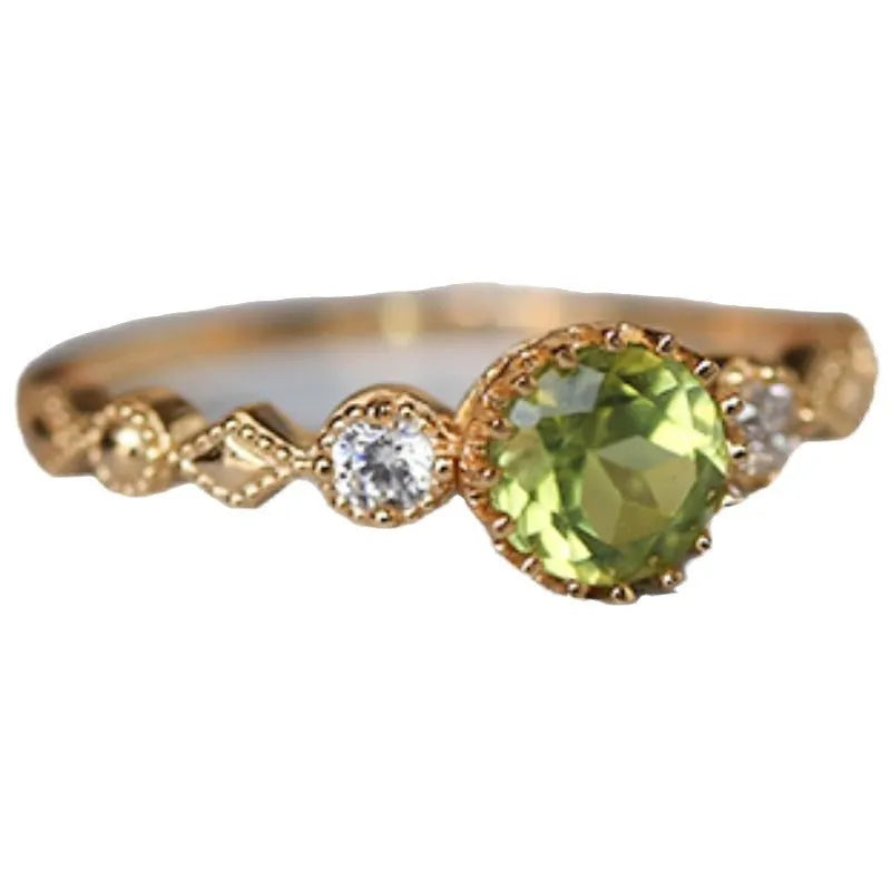 Copper ring with green quadrilateral imitation peridot stone in a Japanese retro geometric design