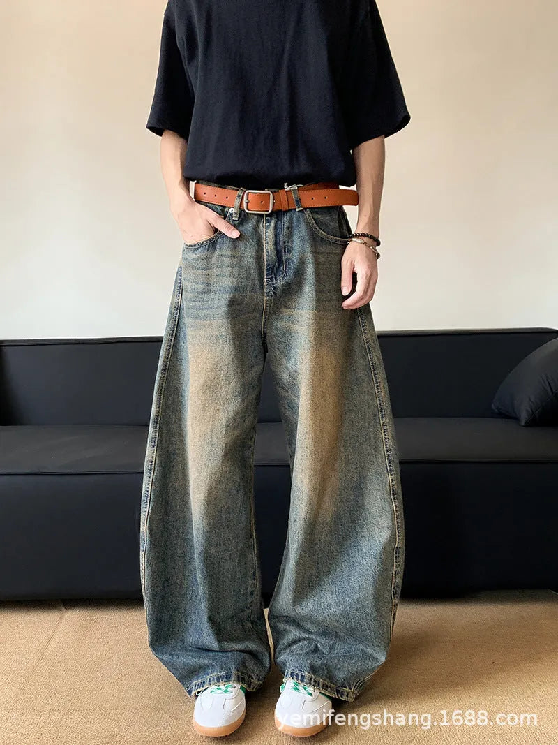 Men's retro blue distressed wide-leg denim jeans with micro-elastic fabric and zipper fly