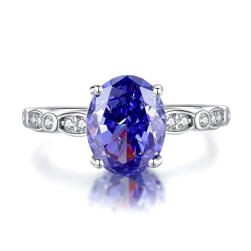 Heart-shaped high carbon zircon stone set in a sterling silver women's ring, shown in a Tan Sang colour.