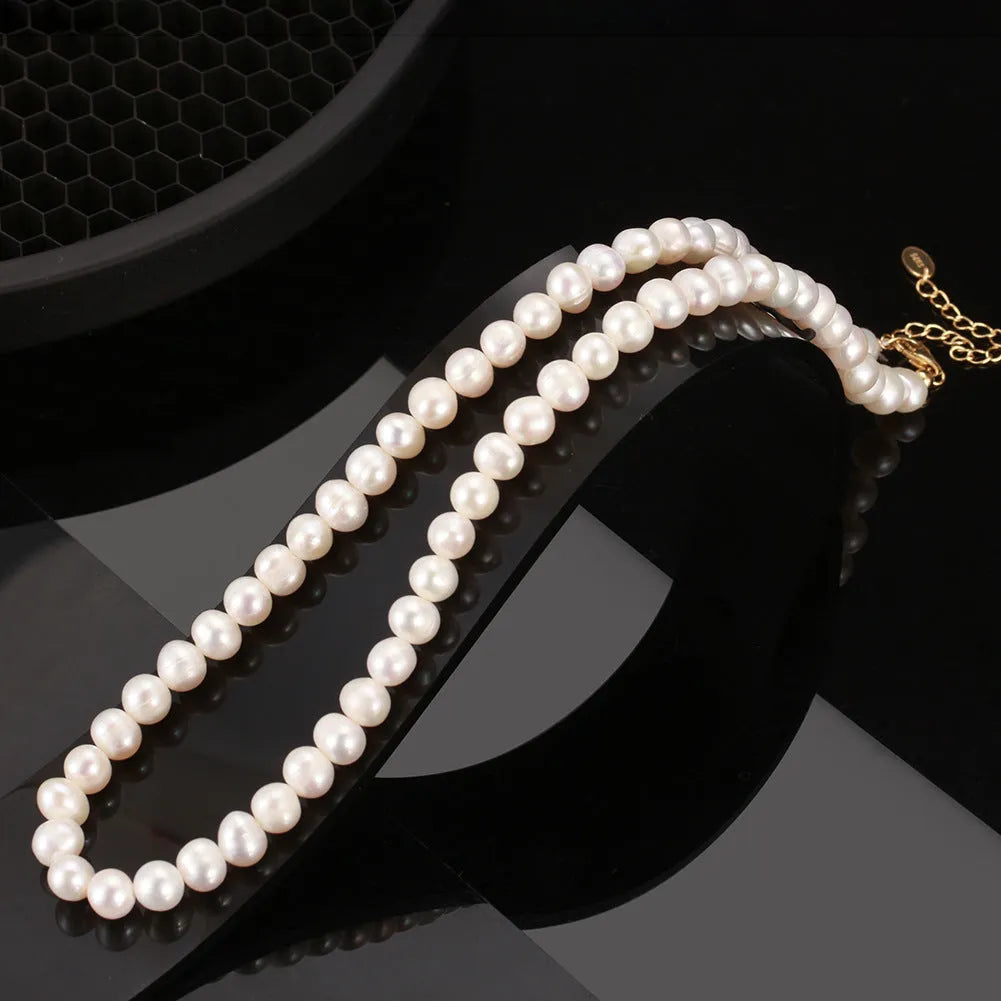 Women's adjustable sterling silver necklace with natural freshwater pearls