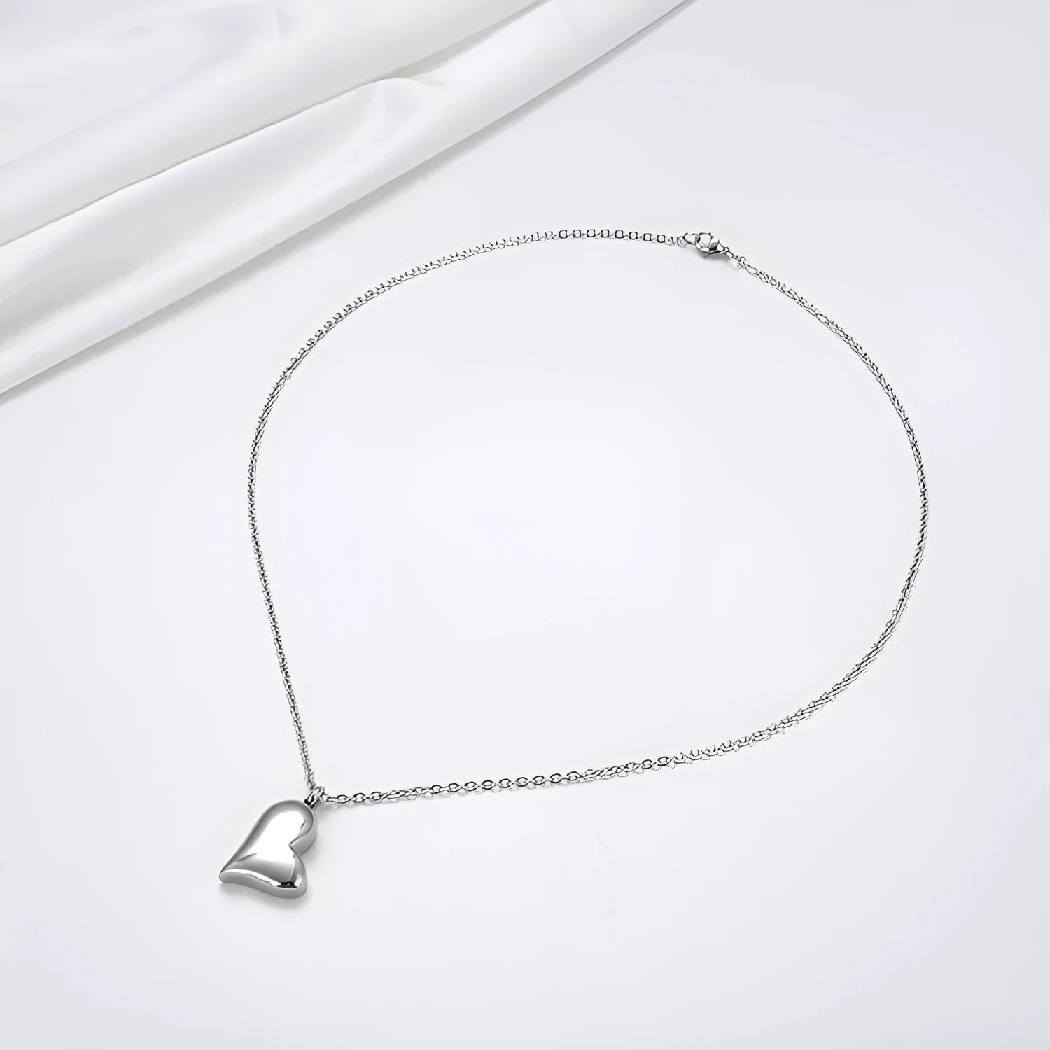 Silver curved peach heart stainless steel pendant necklace with adjustable chain