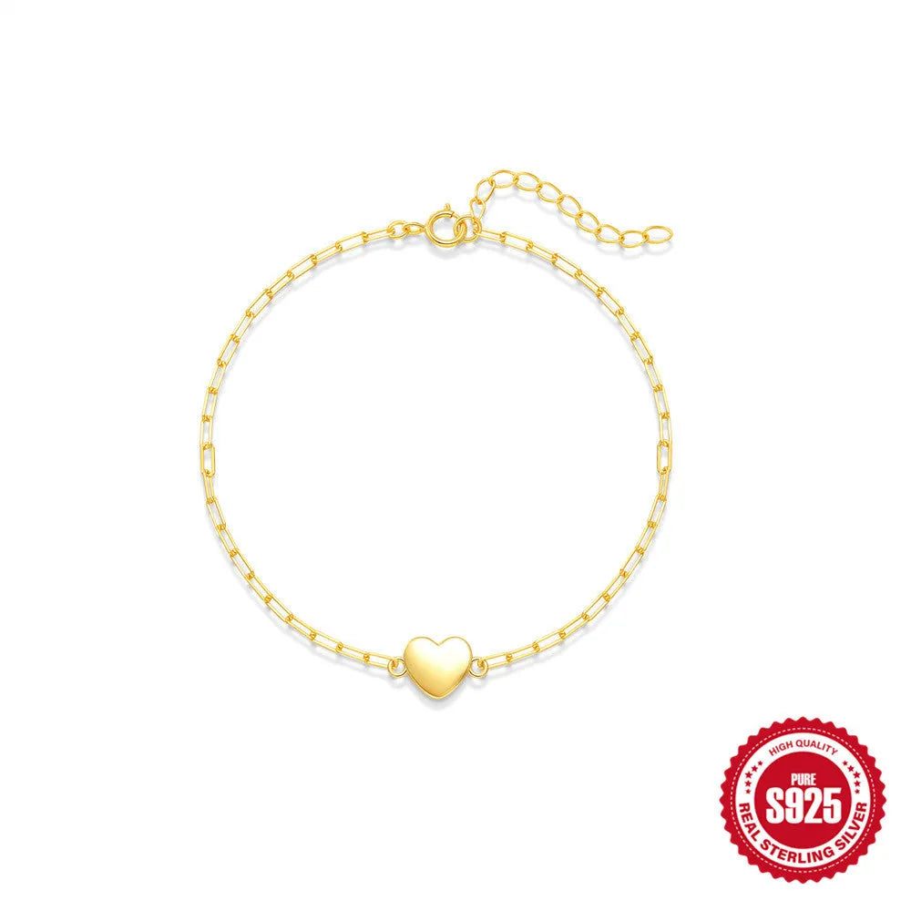 S925 sterling silver bracelet with clip chain and geometric heart charm in gold colour