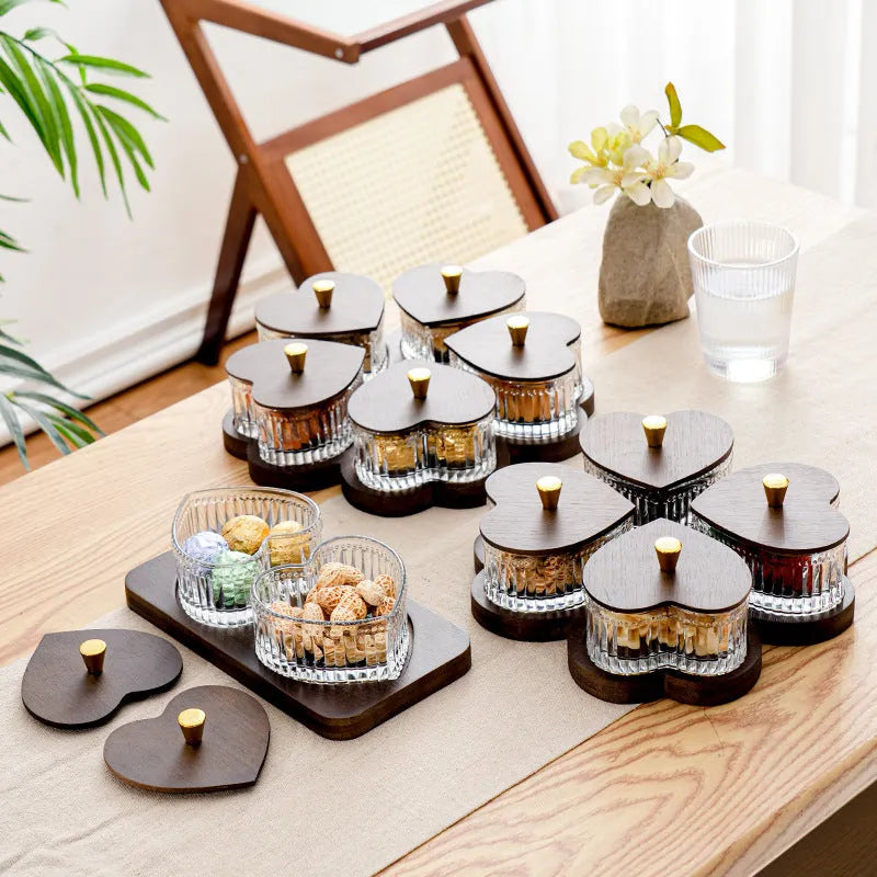 Glass snack plate with heart-shaped lids on a multi-grid tray in a retro style.