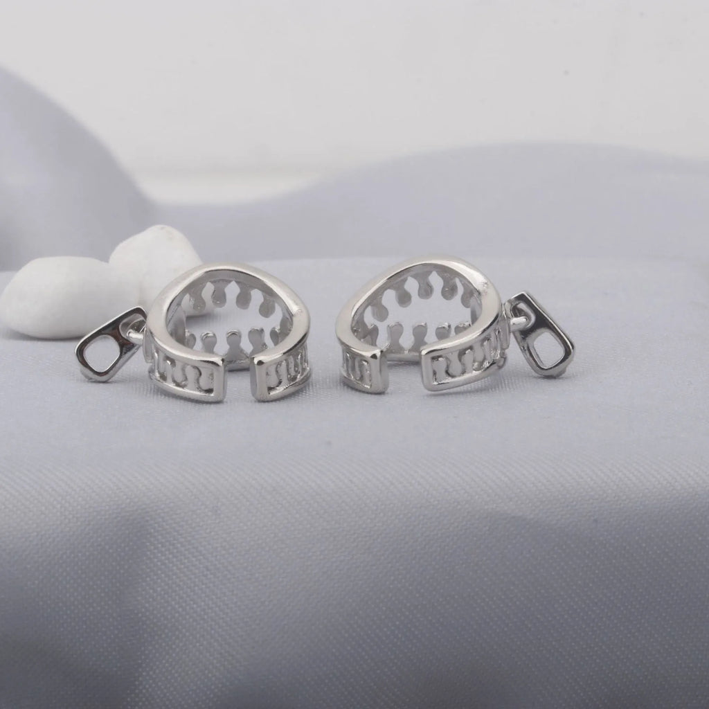 Pair of copper geometric clip-on earrings with minimalist line design in colour ES862.