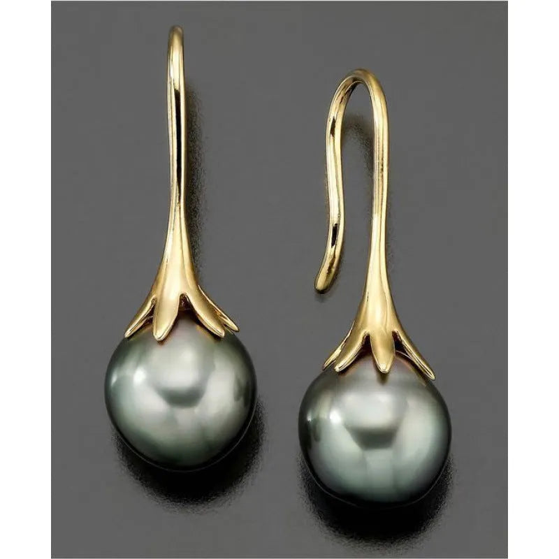 Gold retro style women's fashion earrings with creative design