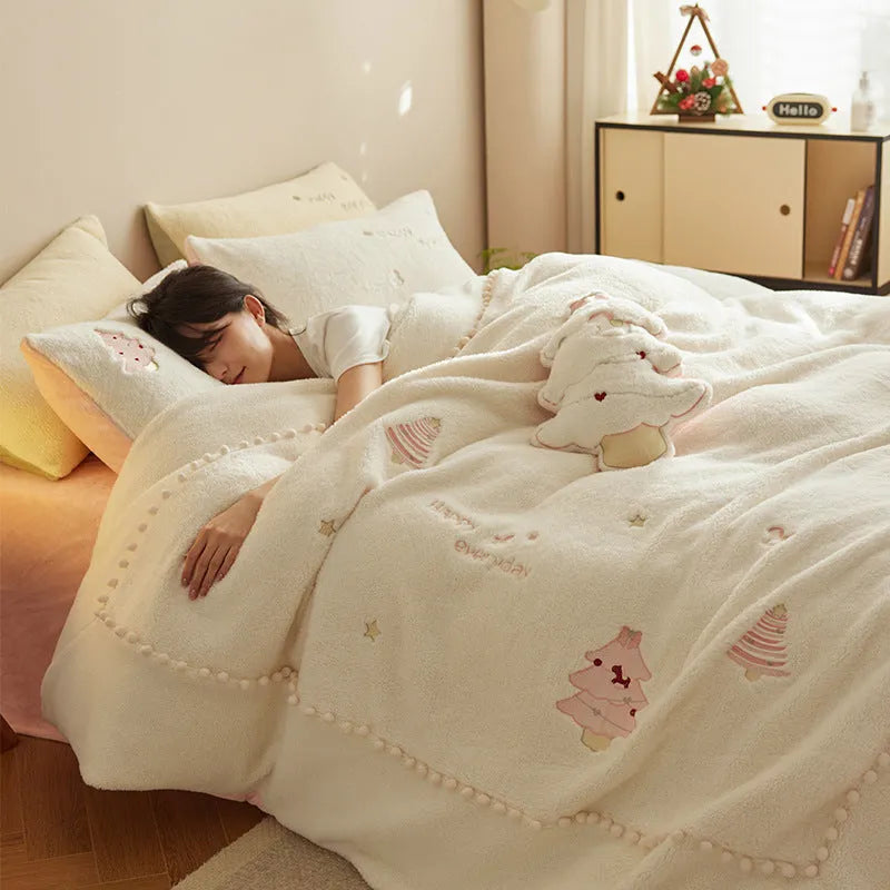 Winter-themed milk fibre bedding set with Christmas tree print on quilt cover and pillowcases.
