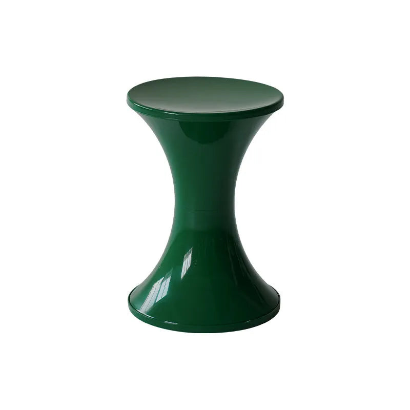 Creative hourglass-shaped plastic stool for changing shoes, shown in a green colour.
