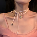 Women's ribbon love pendant necklace on clavicle chain in alloy with electroplated finish