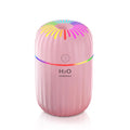 Green mini car-shaped USB aromatherapy humidifier on a white background.