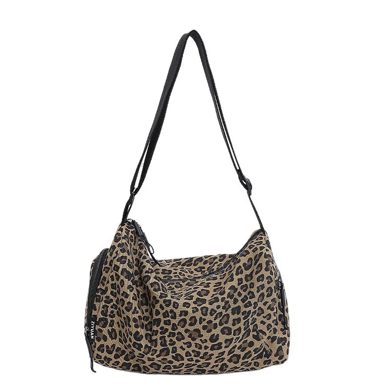 Large capacity leopard print sports style shoulder messenger bag with breathable cloth and stitching details