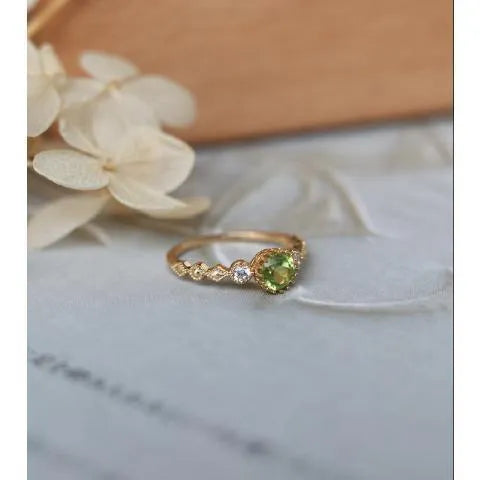 Copper ring with green quadrilateral imitation peridot stone in a Japanese retro geometric design