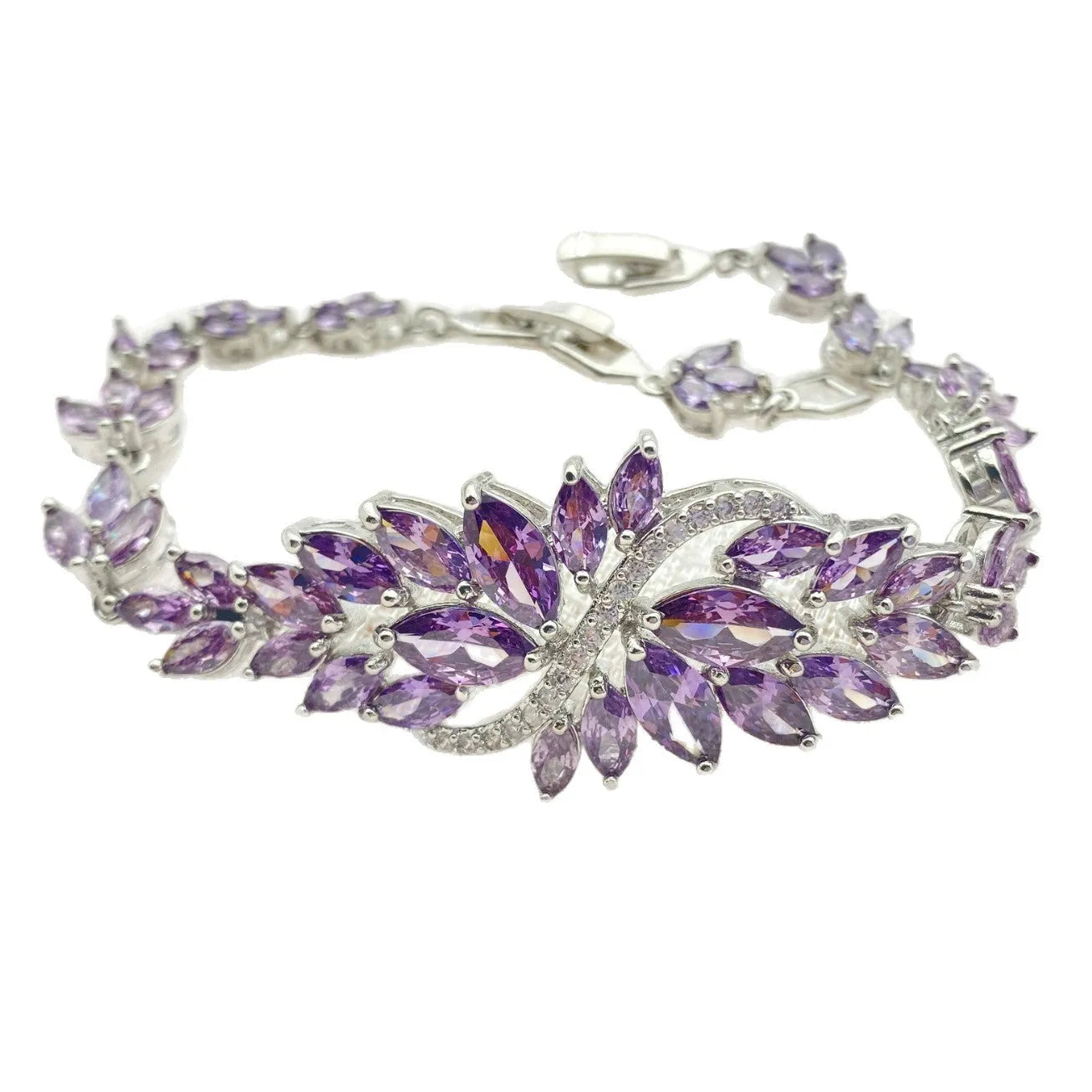 Gold electroplated copper bracelet with ice flower design and blue zircon stones