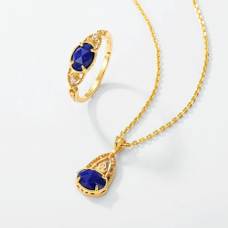 Women's sterling silver ring with a blue lapis lazuli stone in an ellipse shape.