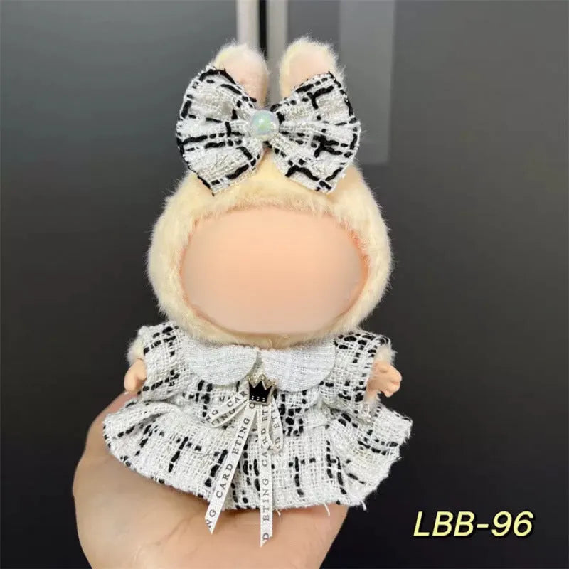 Plastic doll costume for a 17cm tall vinyl figurine on a white background.