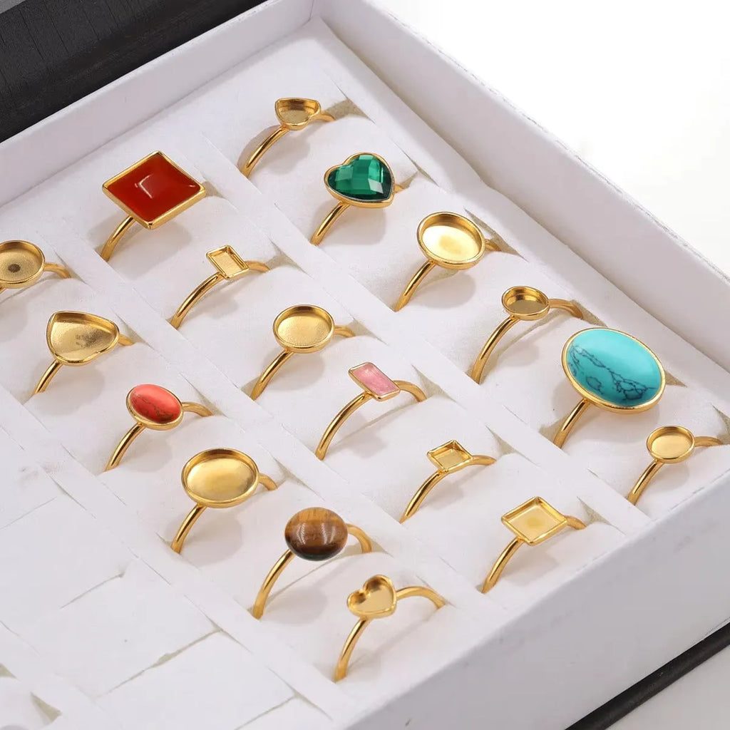 Stainless steel golden electroplated ring settings in multiple shapes including oval, heart, rectangle, round and square