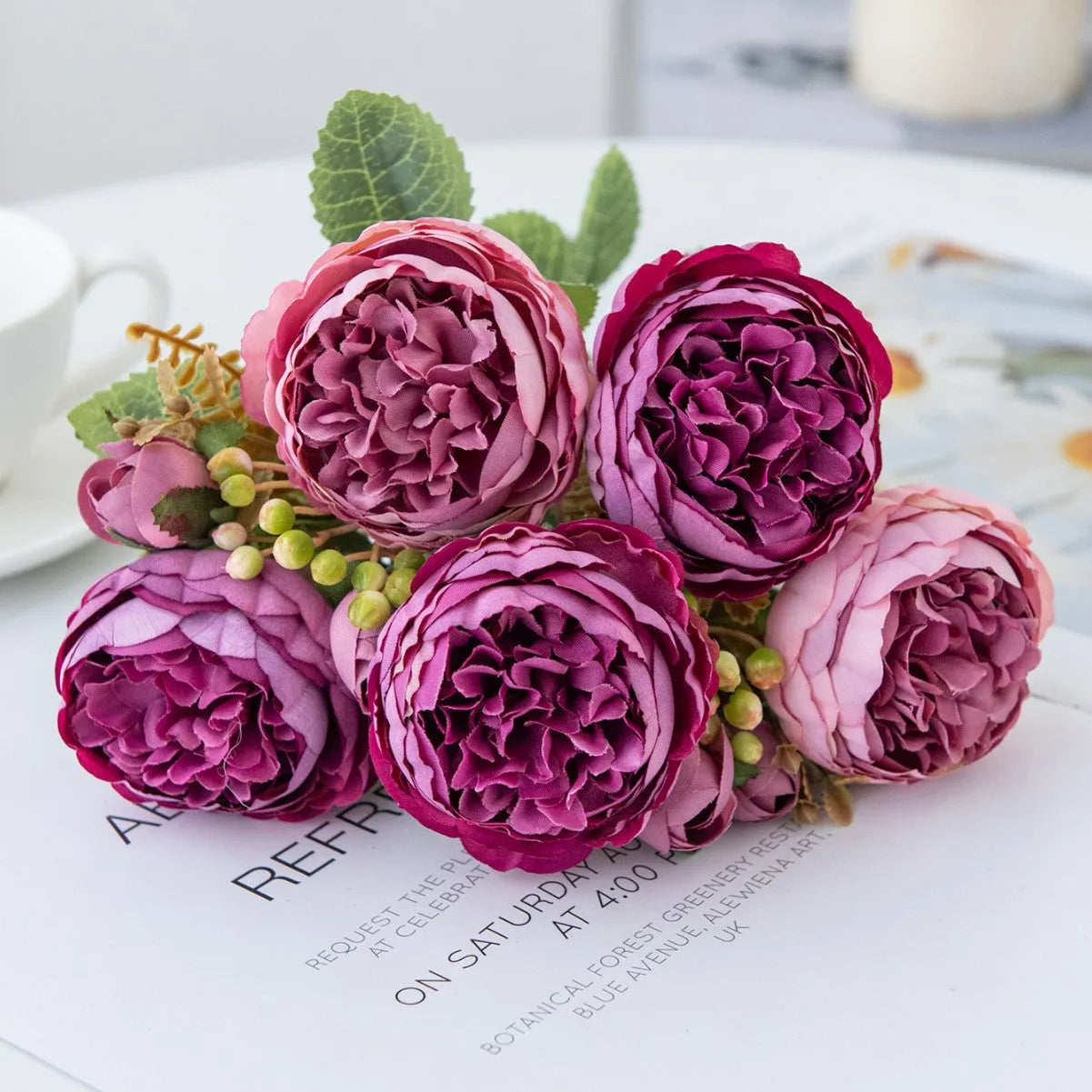 Artificial silk peony flower bouquet in champagne, pink, purple, sand red, or white for home and event decoration.