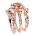 Geometric flower design women's ring with rose inlaid zircon in choice of rose gold, black pink diamond, or multi-colour rhinestone finish.