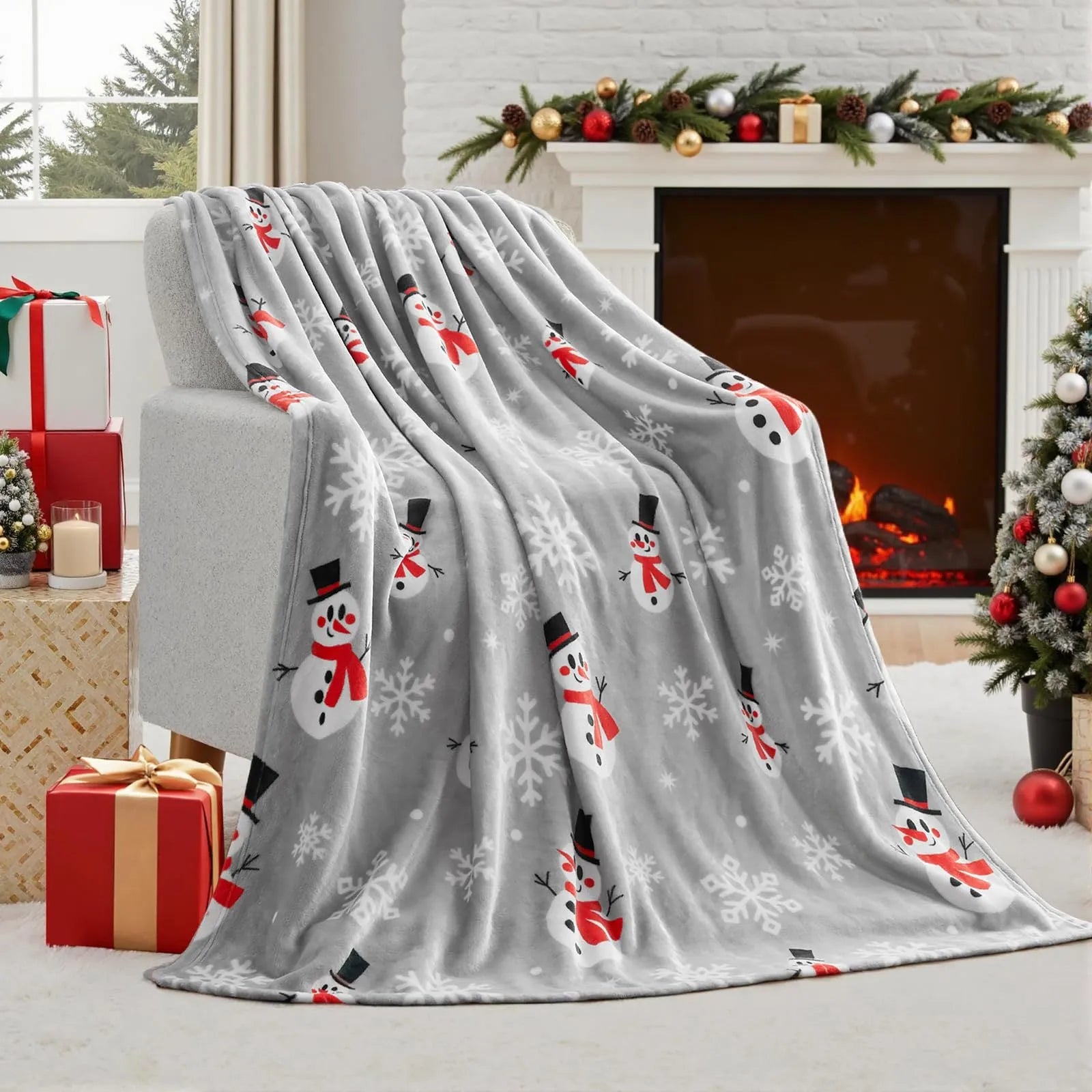Soft red plush Christmas blanket draped over a sofa corner.