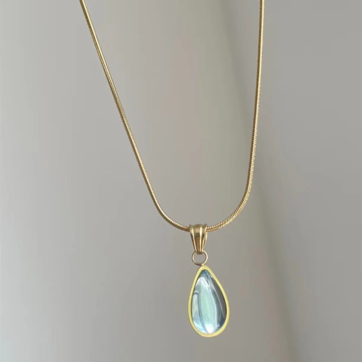 Retro blue and green water drop necklace with mixed gem inlay on titanium steel snake chain